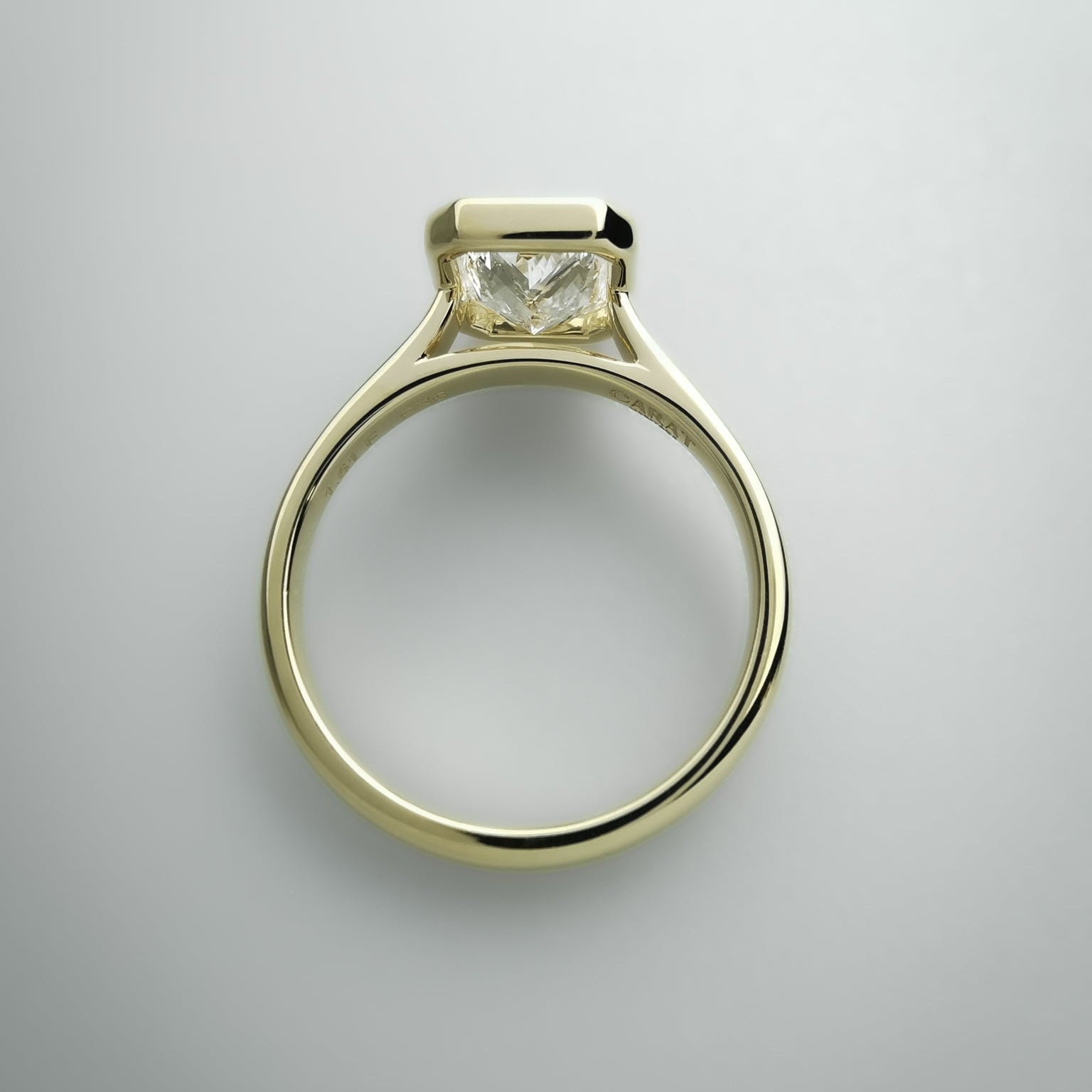 Radiant cut yellow gold ring top view
