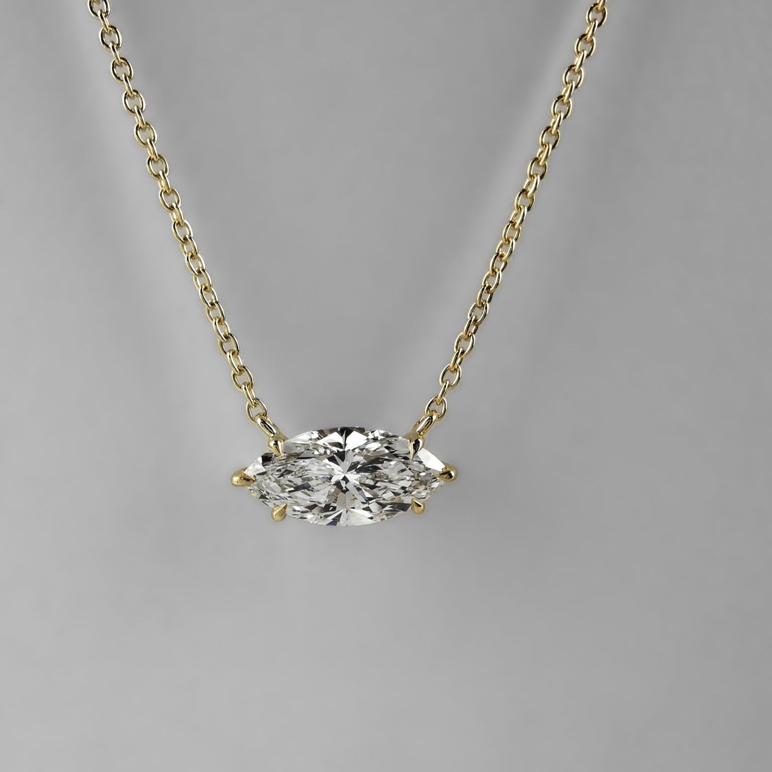 Marquise diamond pendant necklace on gold chain