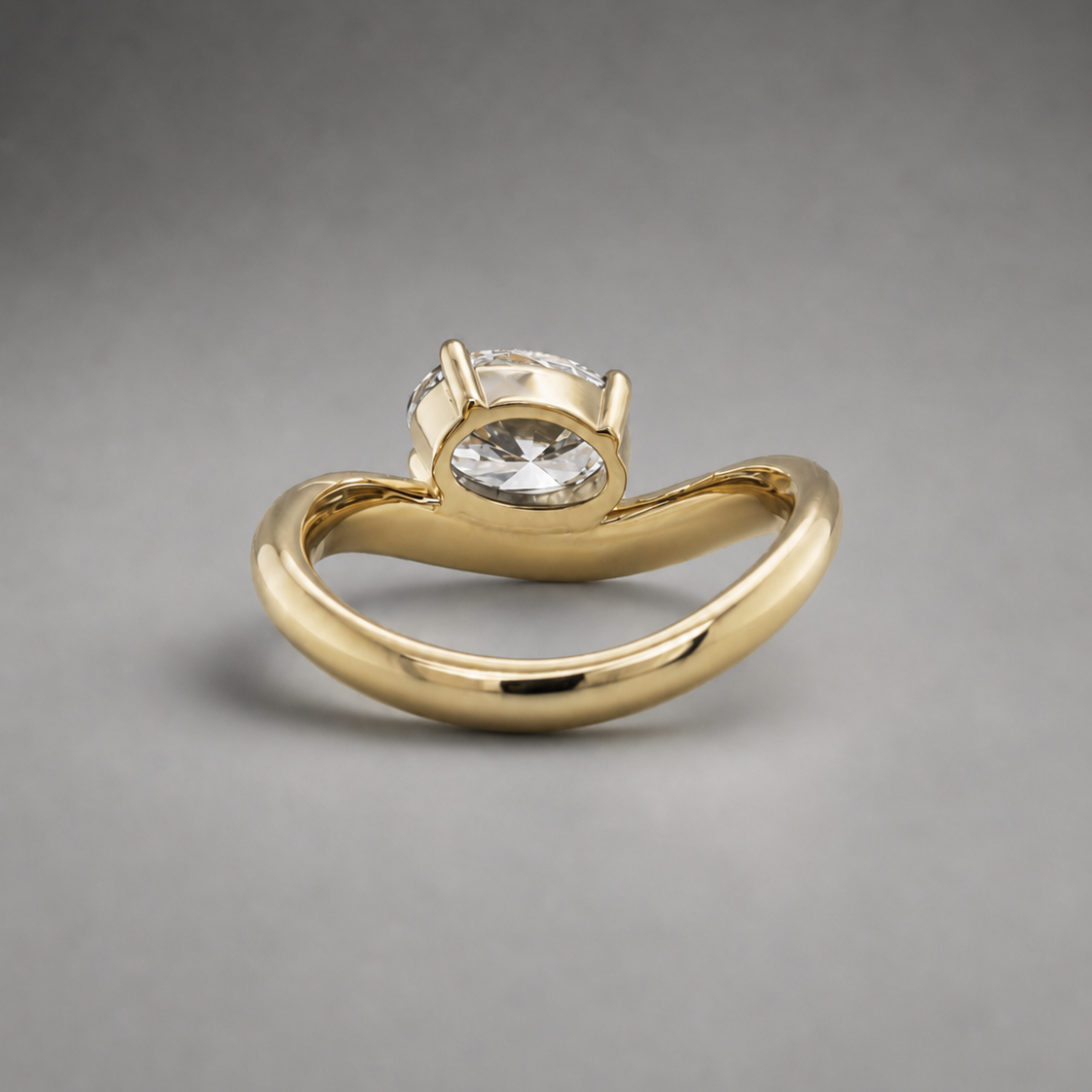 oval diamond on wave gold band