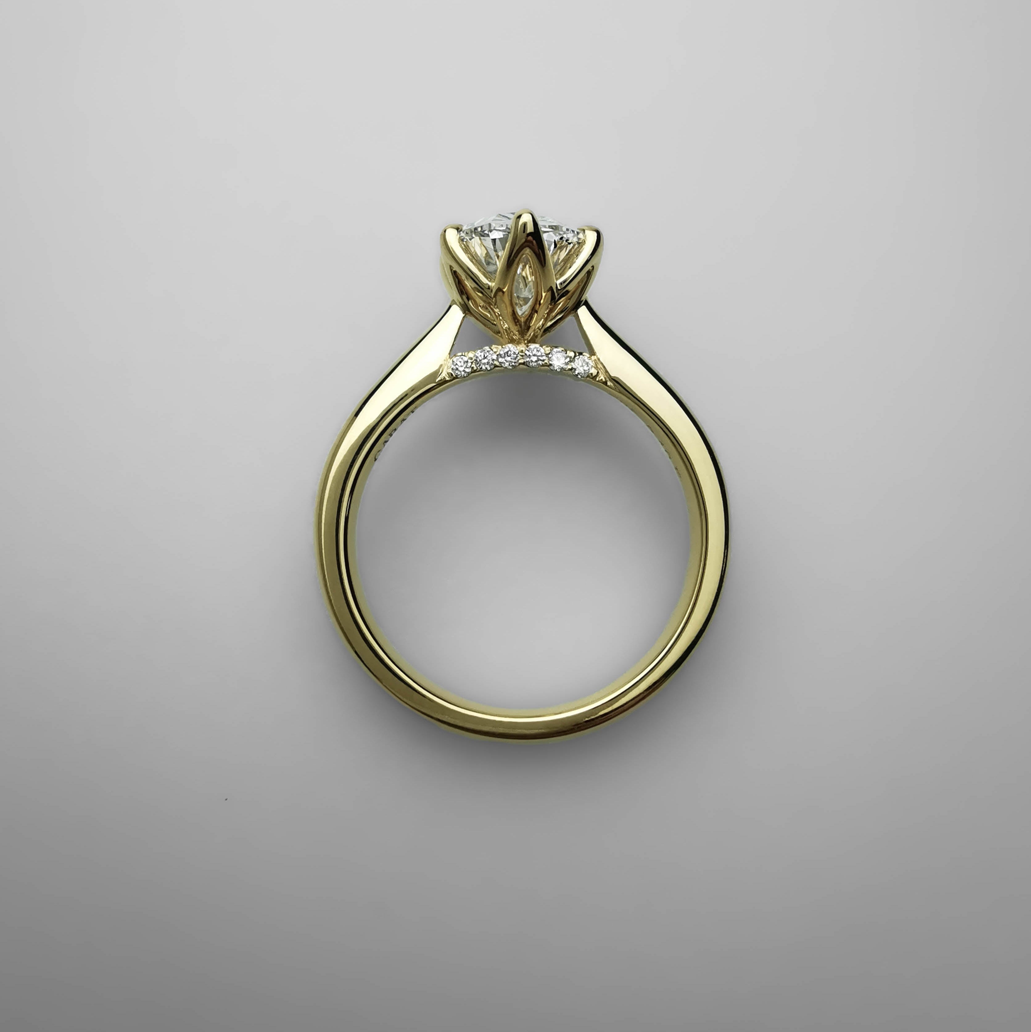 2 carat oval tulip prong setting yellow gold ring with diamonds on bridge