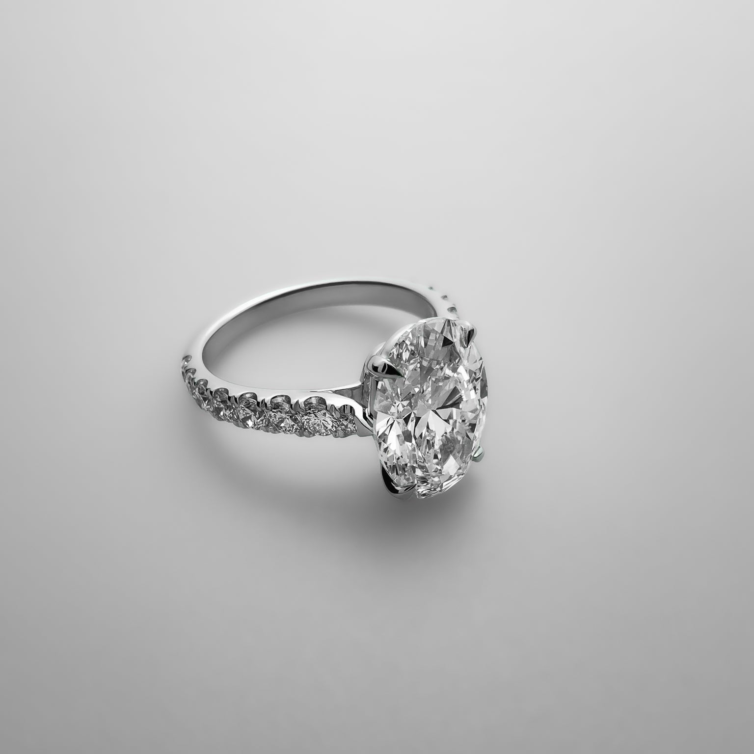 Oval diamond ring 3 carat slanted