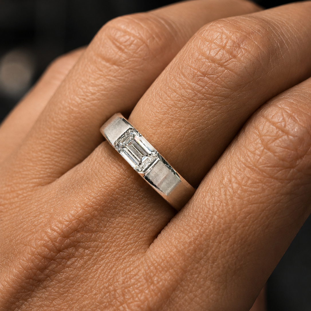 emerald mens wedding band on hand