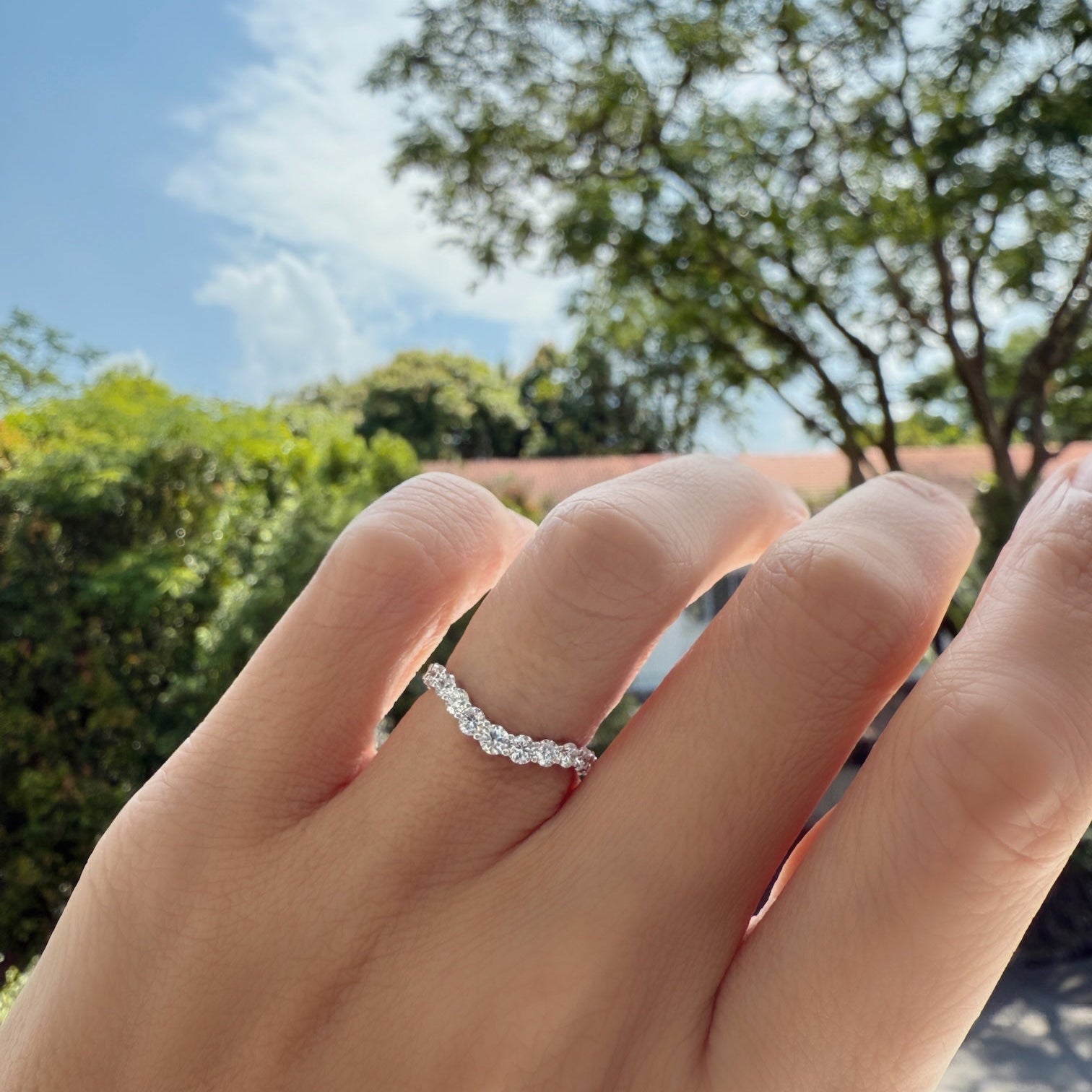 Curved Eternity Ring on hand