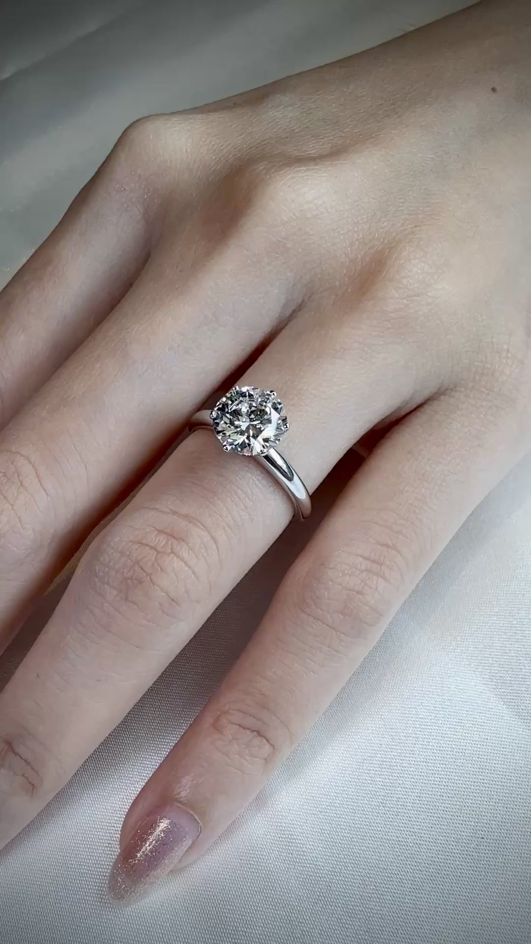 Solitaire Diamond Ring on Finger