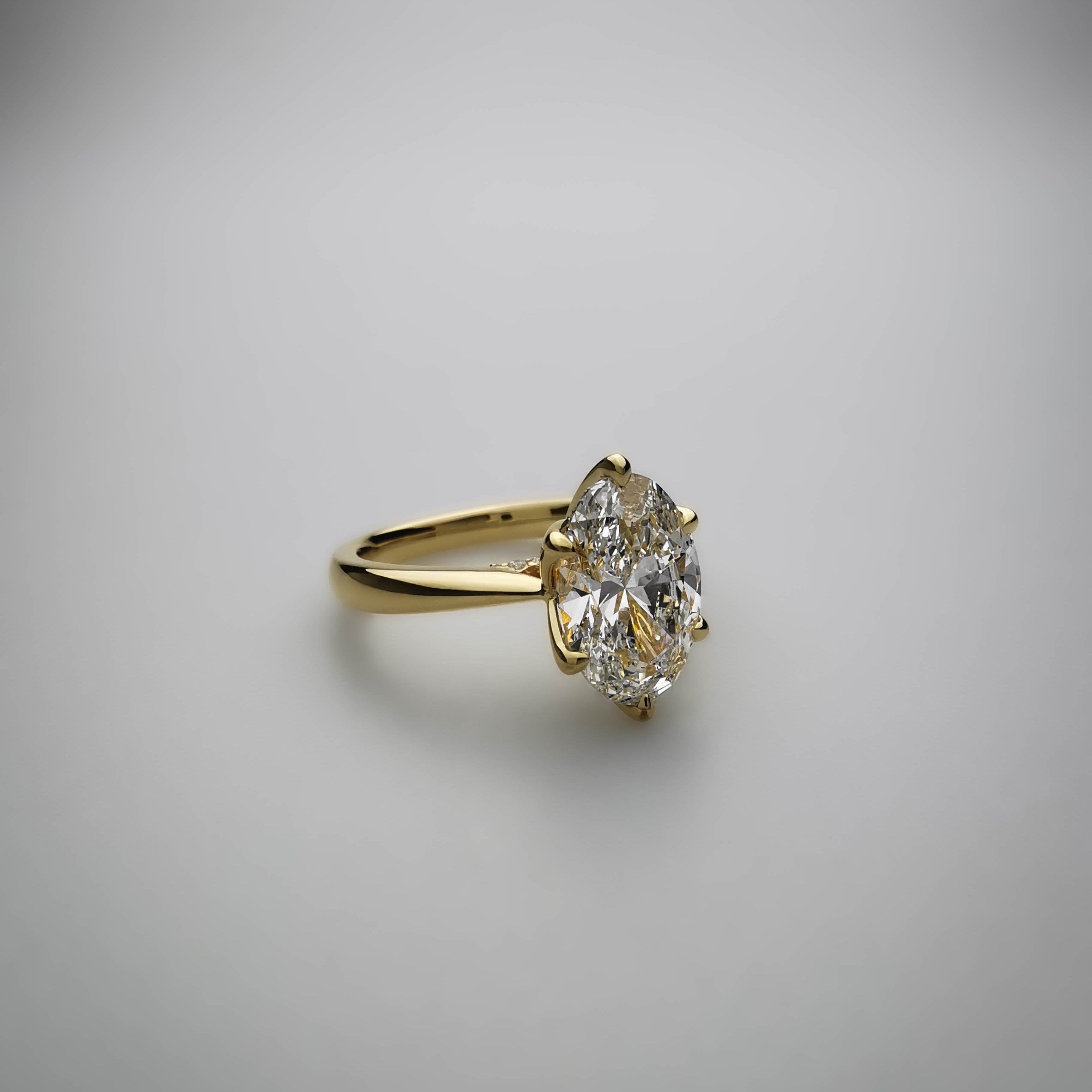 2 carat oval tulip prong setting yellow gold ring