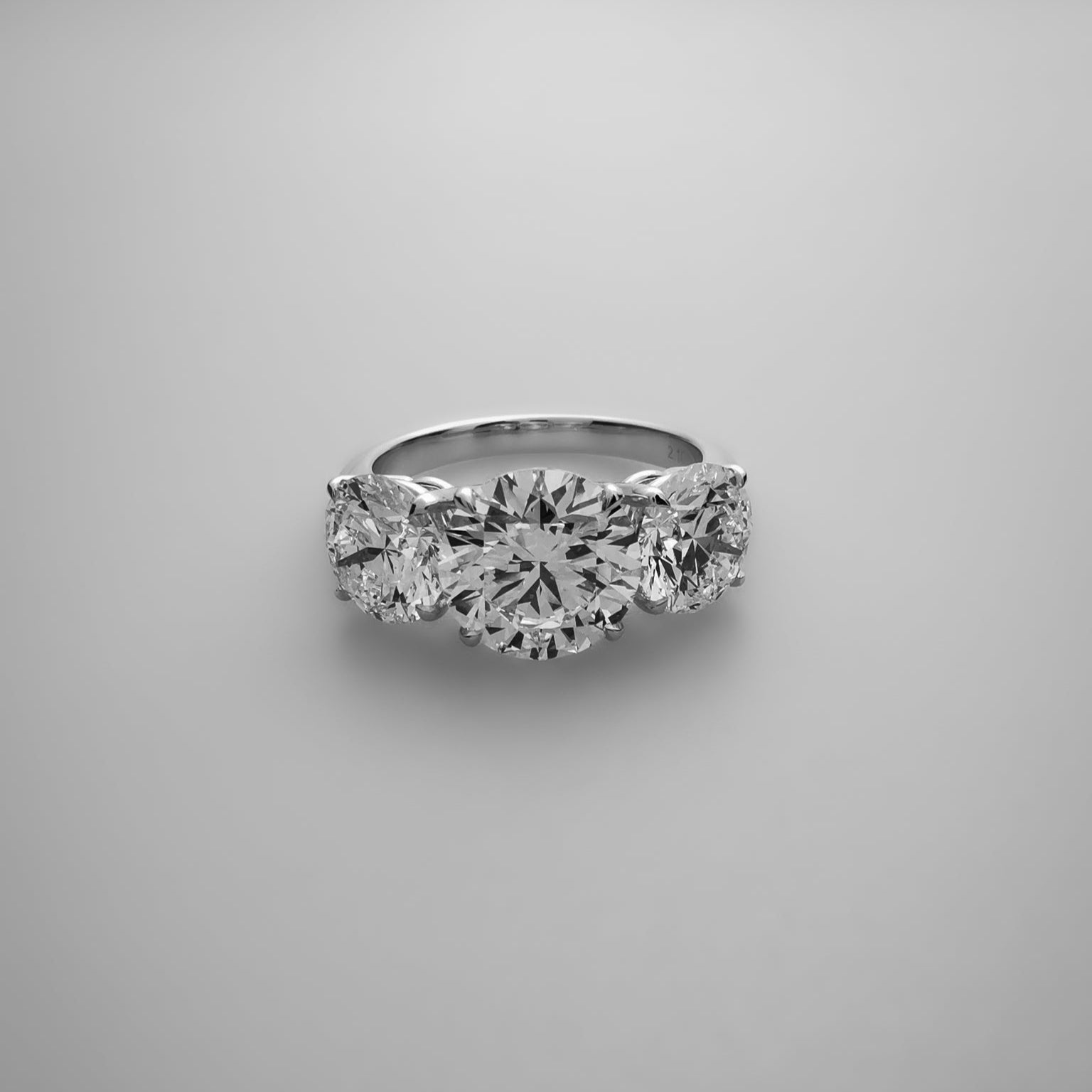 Trilogy round diamond ring 18k white gold