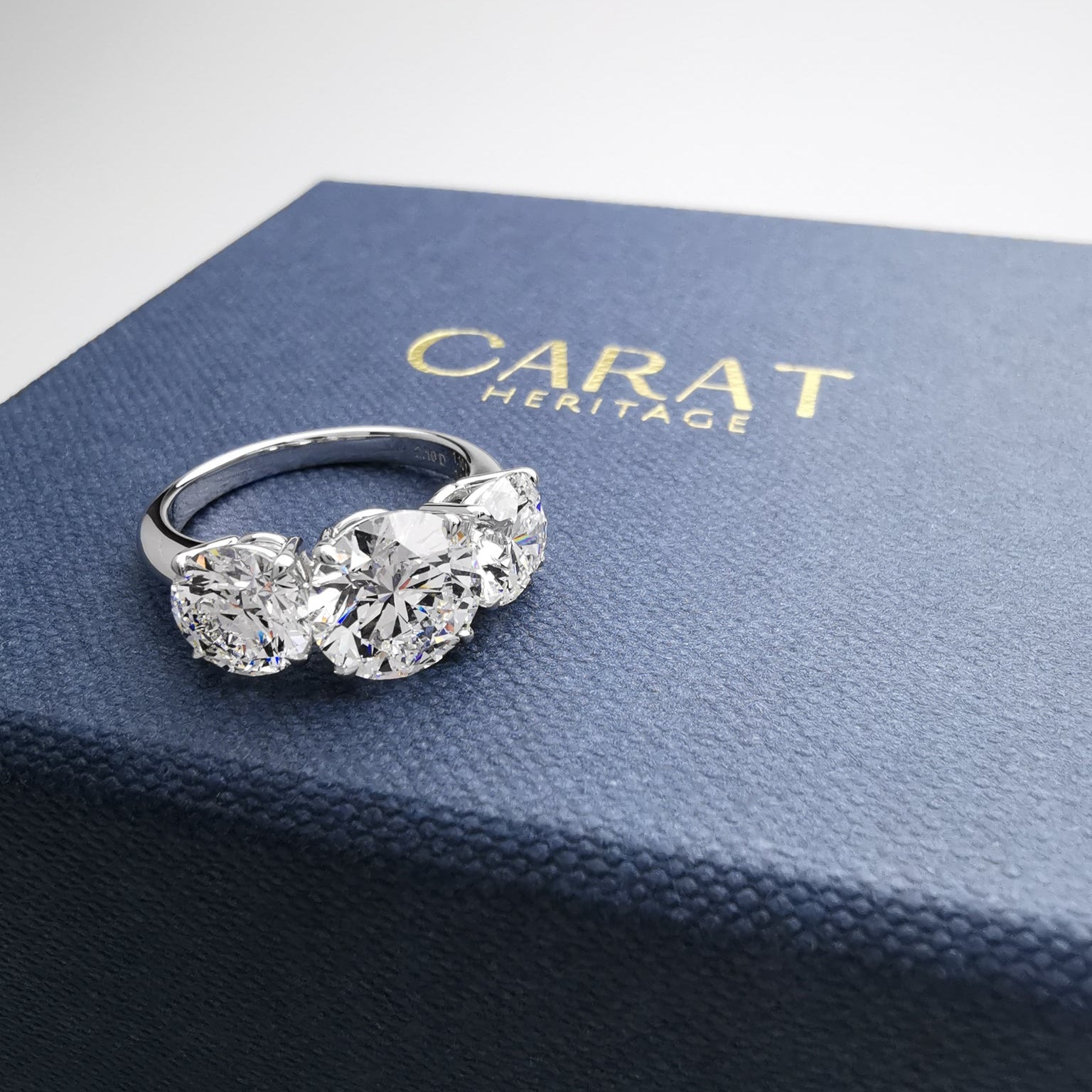 Trilogy diamond ring on boc