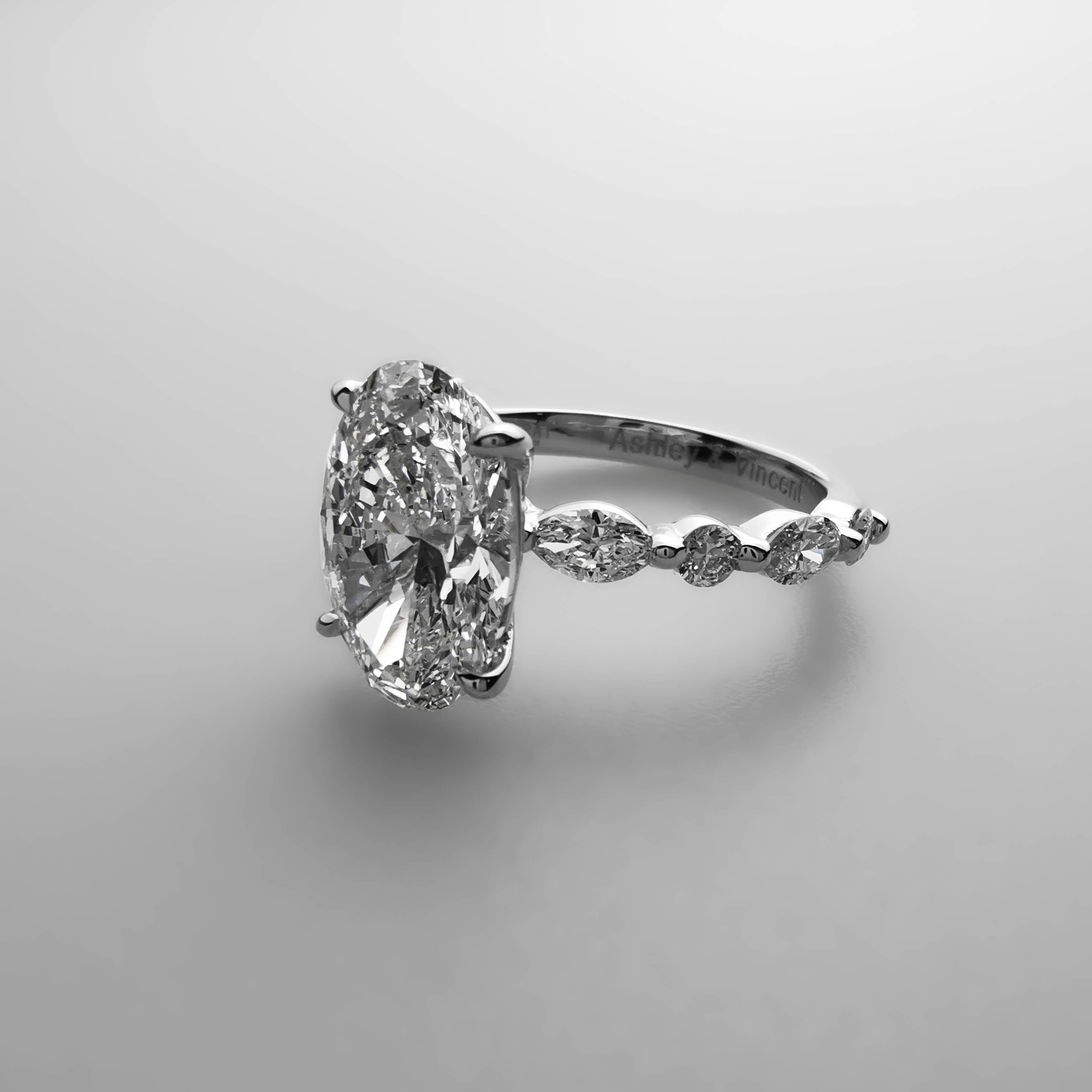 3ct Oval diamond ring with alternating Marquise and Round side diamonds side view