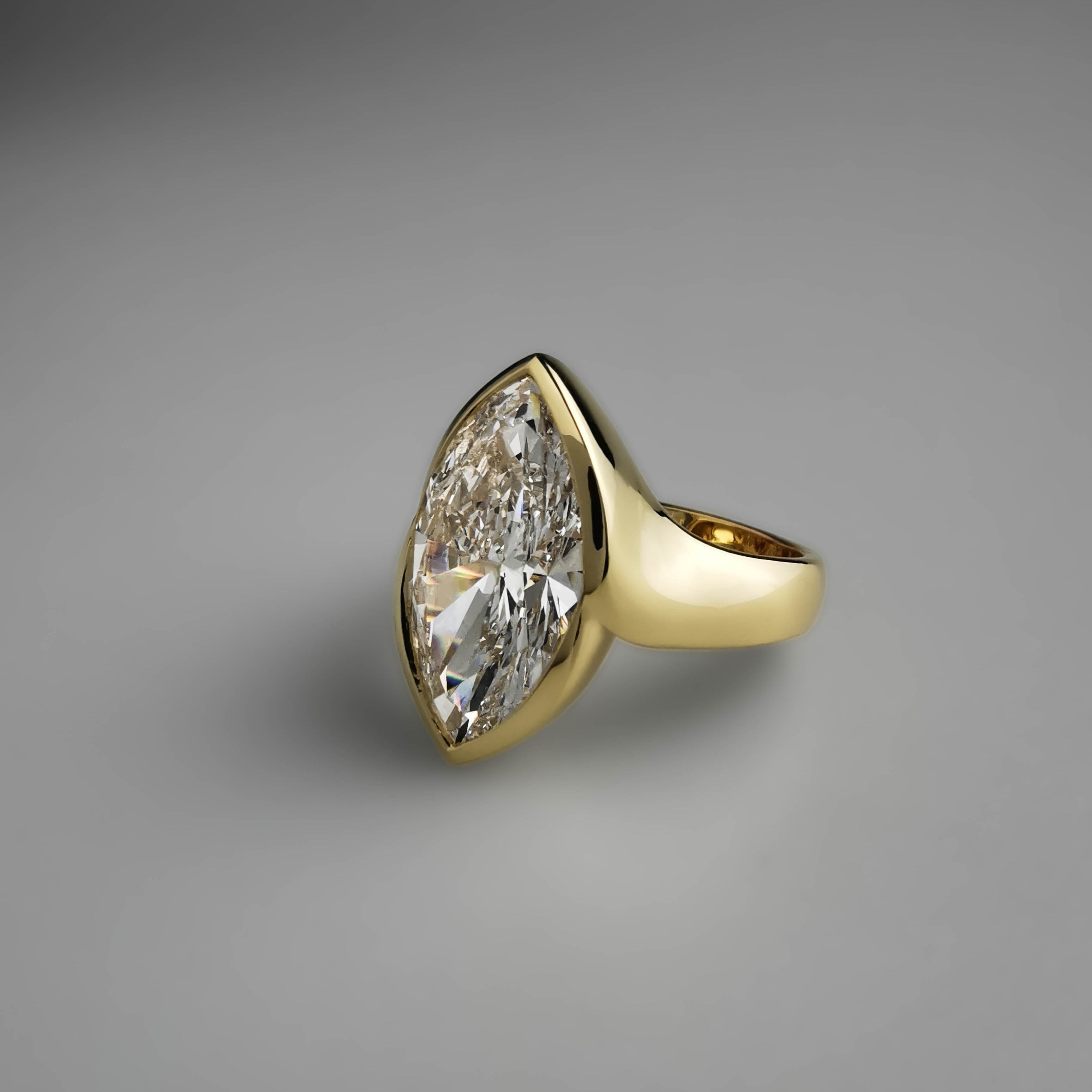 Marquise Diamond Bezel Ring in Yellow Gold side view
