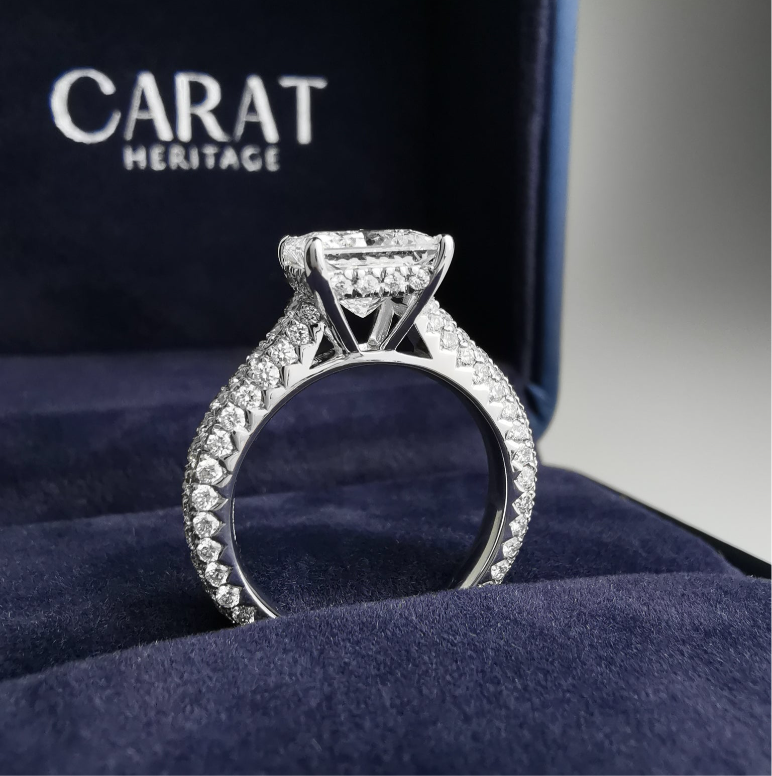 Princess cut ring with pave diamonds