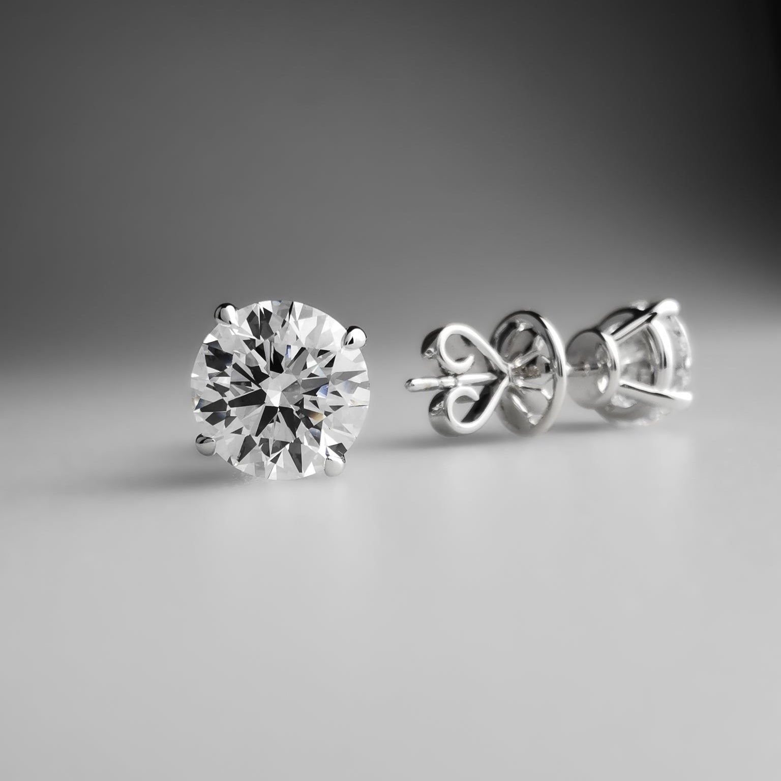 solitaire diamond ear studs