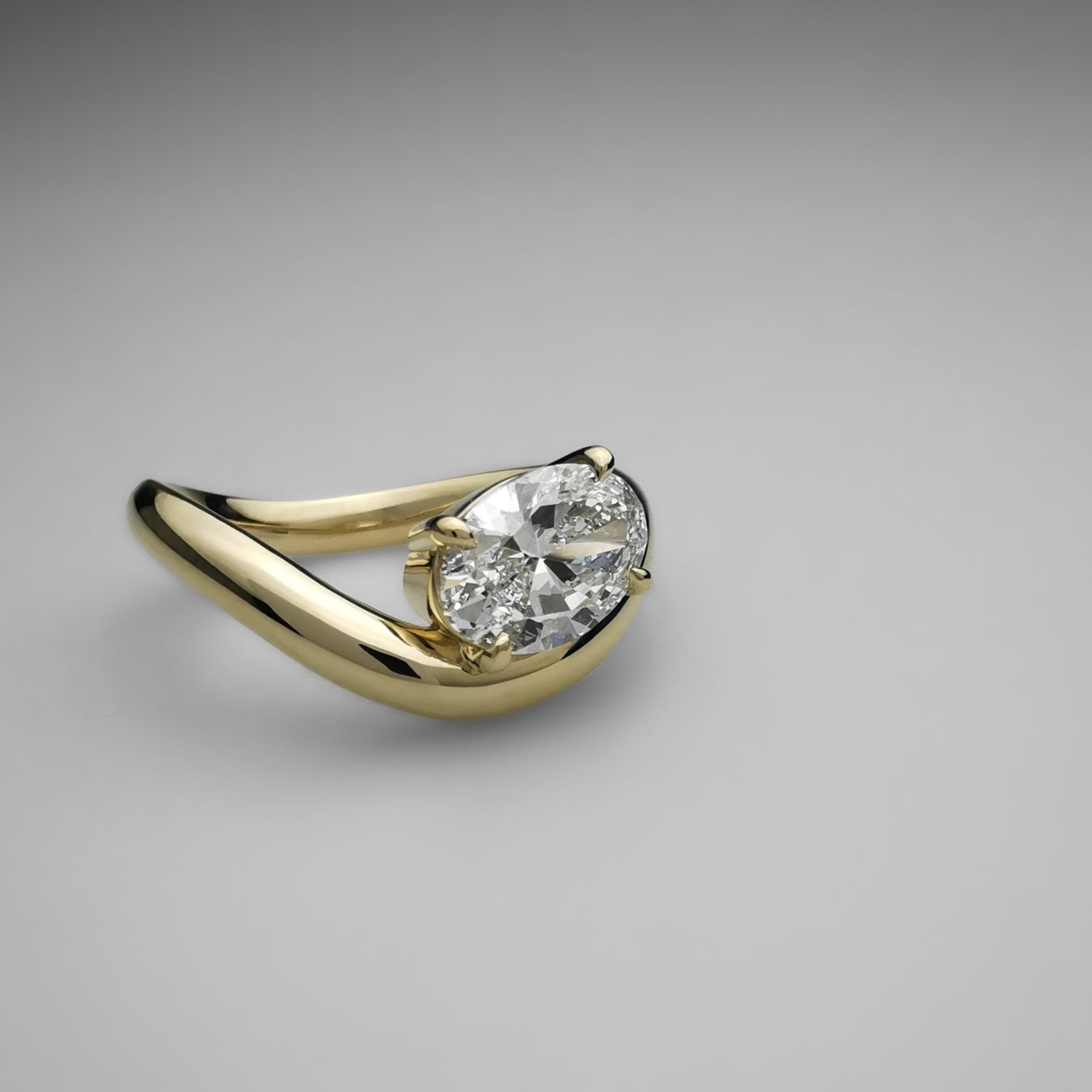 yellow gold oval ring wave curvey band organic
