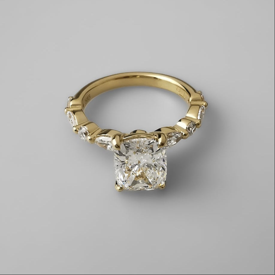 1.5ct cushion cut diamond yellow gold ring top view