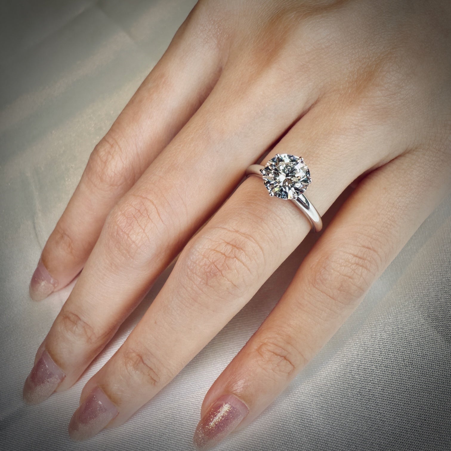 Tiffany Setting 6 Prong ring on hand
