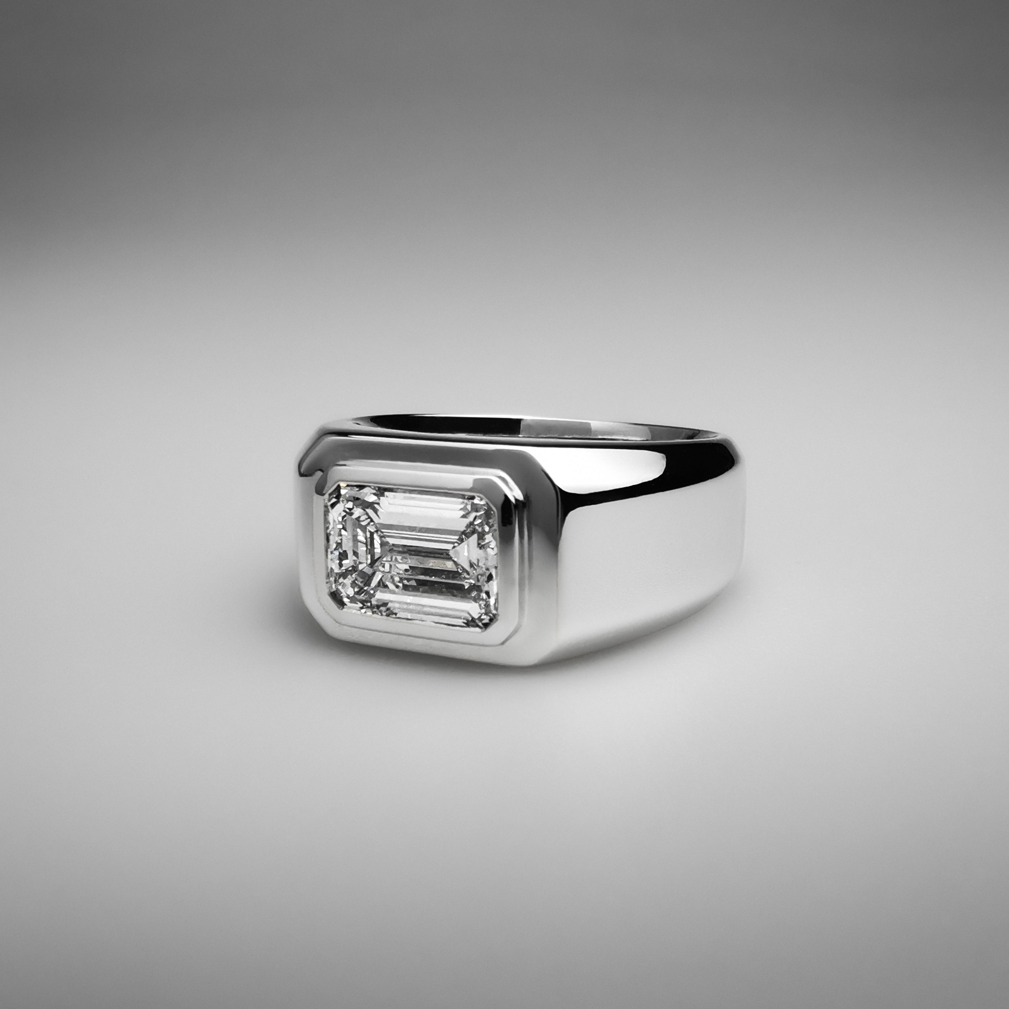 East West Emerald Diamond Ring
