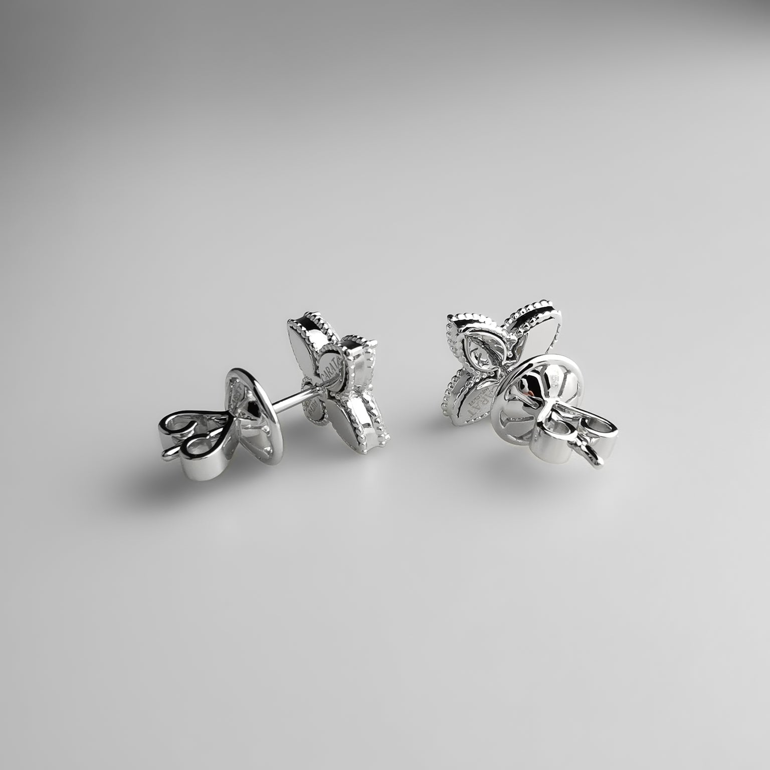 Diamond flower ear studs pear shaped