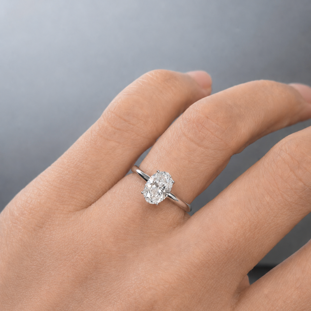 1.3ct oval diamond ring on hand