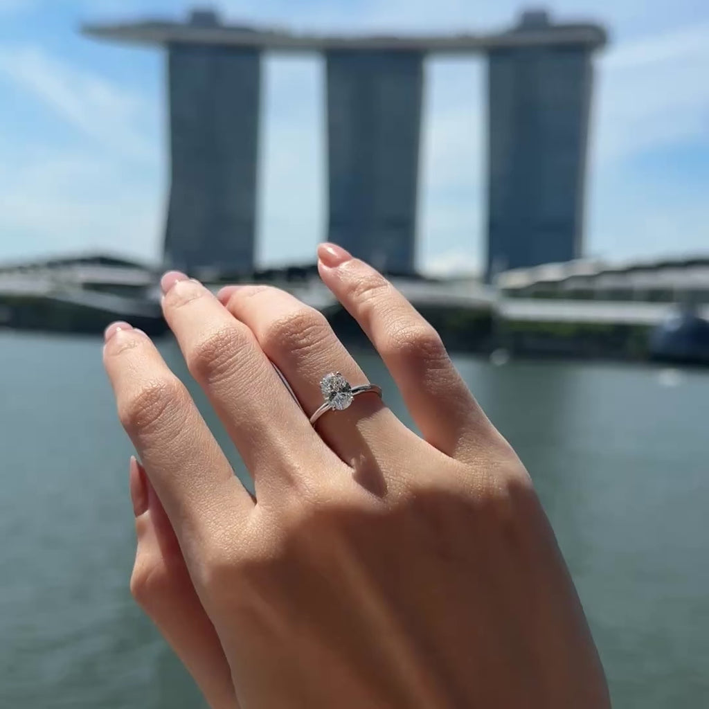 Oval Cut Diamond Ring with Hidden Halo